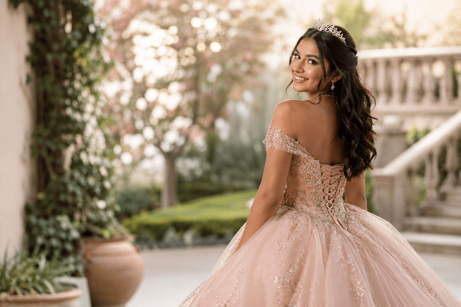 Sofia celebrating her quinceañera in a blush dress